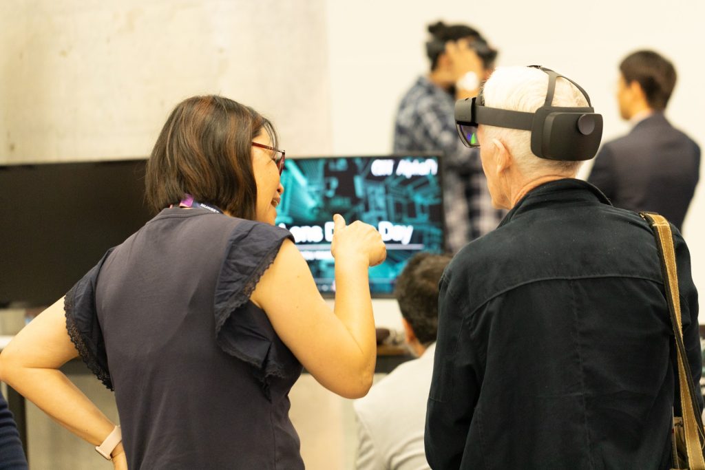 Nurse trying HoloLens mixed reality at the conference